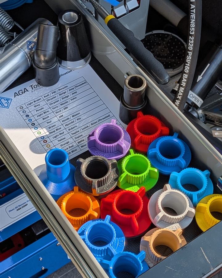 Drawer of color-coded vacuum adapters with a size chart, next to the vacuum regulator.
